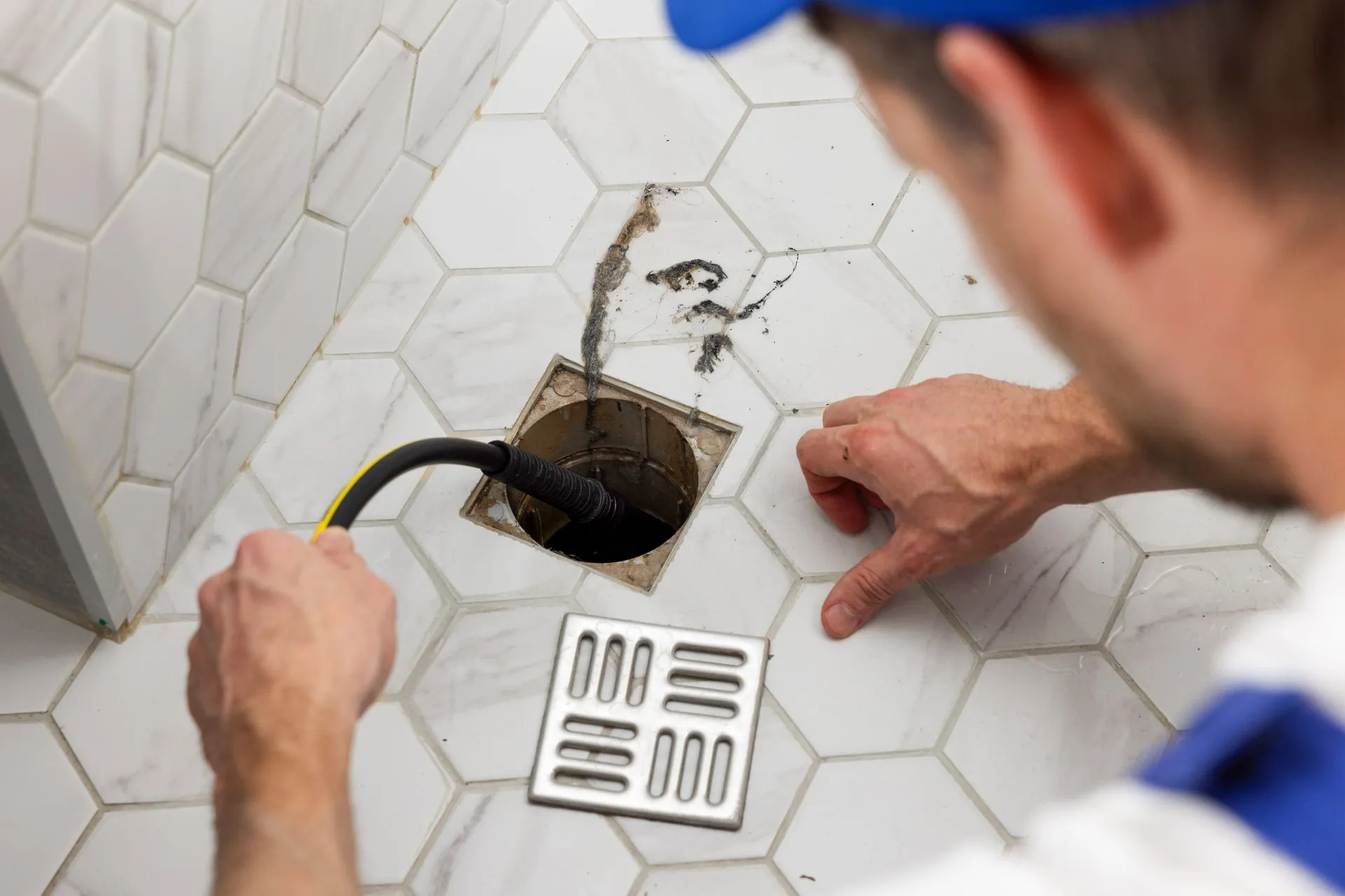 Technician responding to an emergency drain service call
